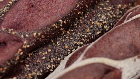 fresh rye brown bread close-up. artisan bread is making by skill bakers using natural and high-quality ingredients. food with health and flavour benefits. bakery shop and market
