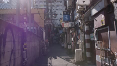 sunlit japanese alleyway