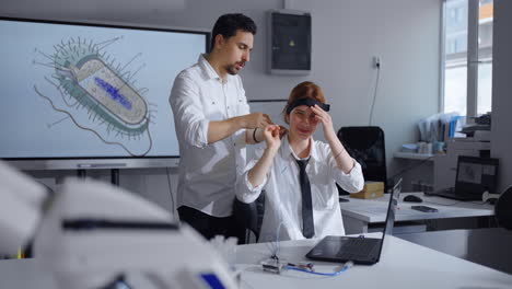 man and woman scientist working in the lab