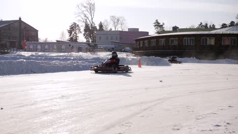 go-karting on a snowy track