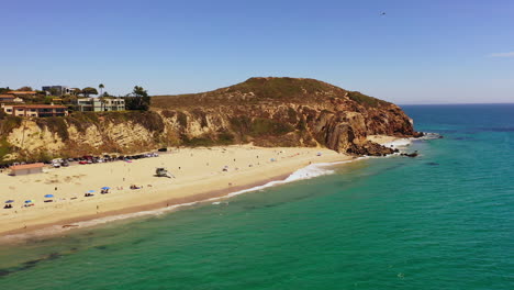 Aerial-drone-shot-of-the-famous-point-Dume-state-beach-in-Malibu,-California-on-a-sunny-summer-day