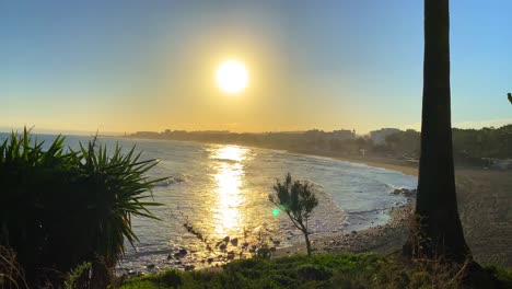 amazing sunset by the beach with a sea view and blue sky in estepona spain, 4k static shot