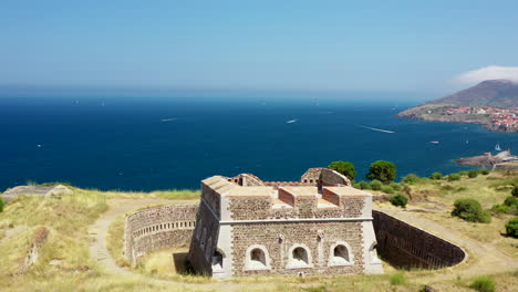 aerial shot near the historical town and port of collioure and the french spanish border at the mediterranean sea