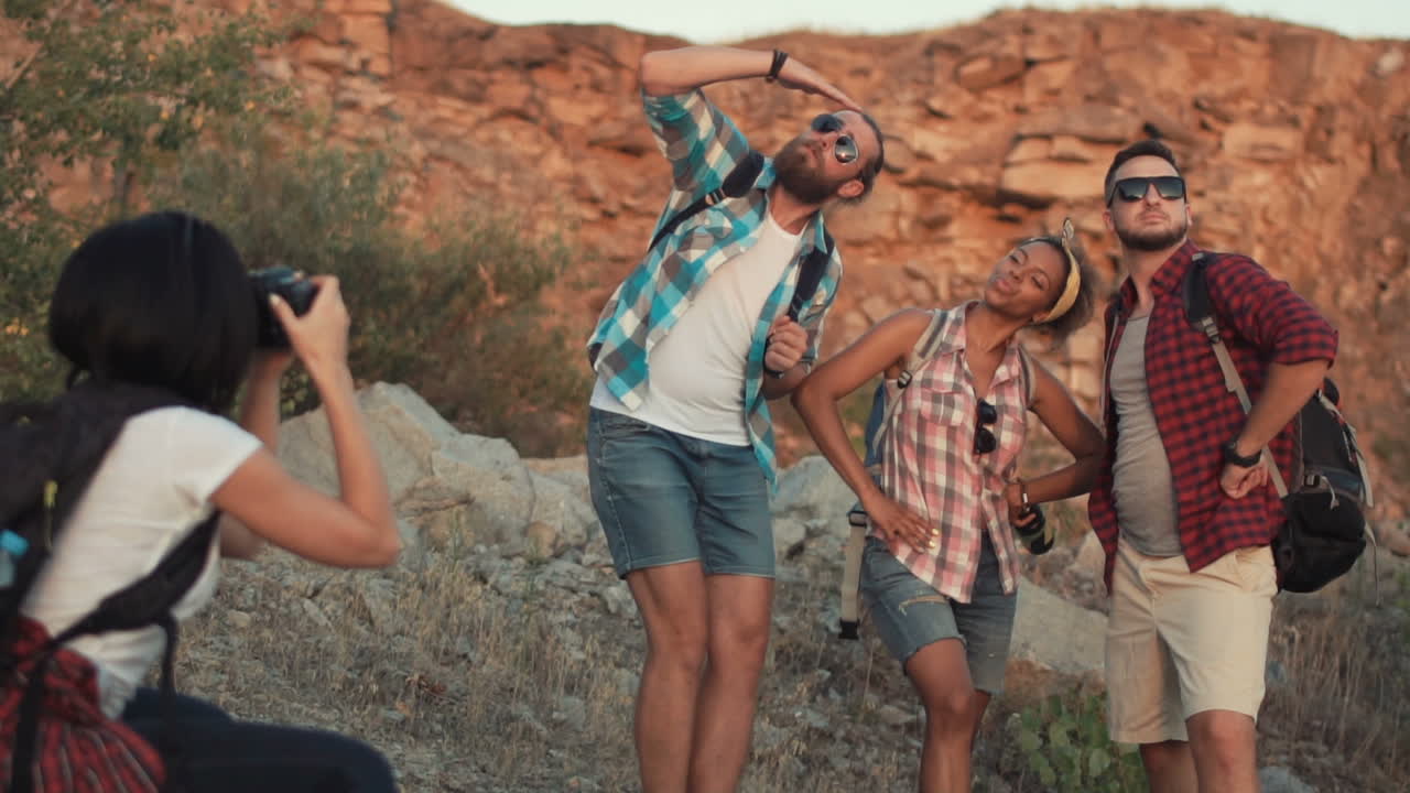 Friends on a hiking trip posing for a photo