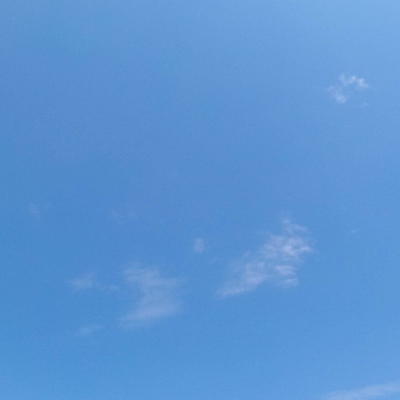 Azure summer sky with light white cloudscape. Beautiful blue sky clears up. Timelapse