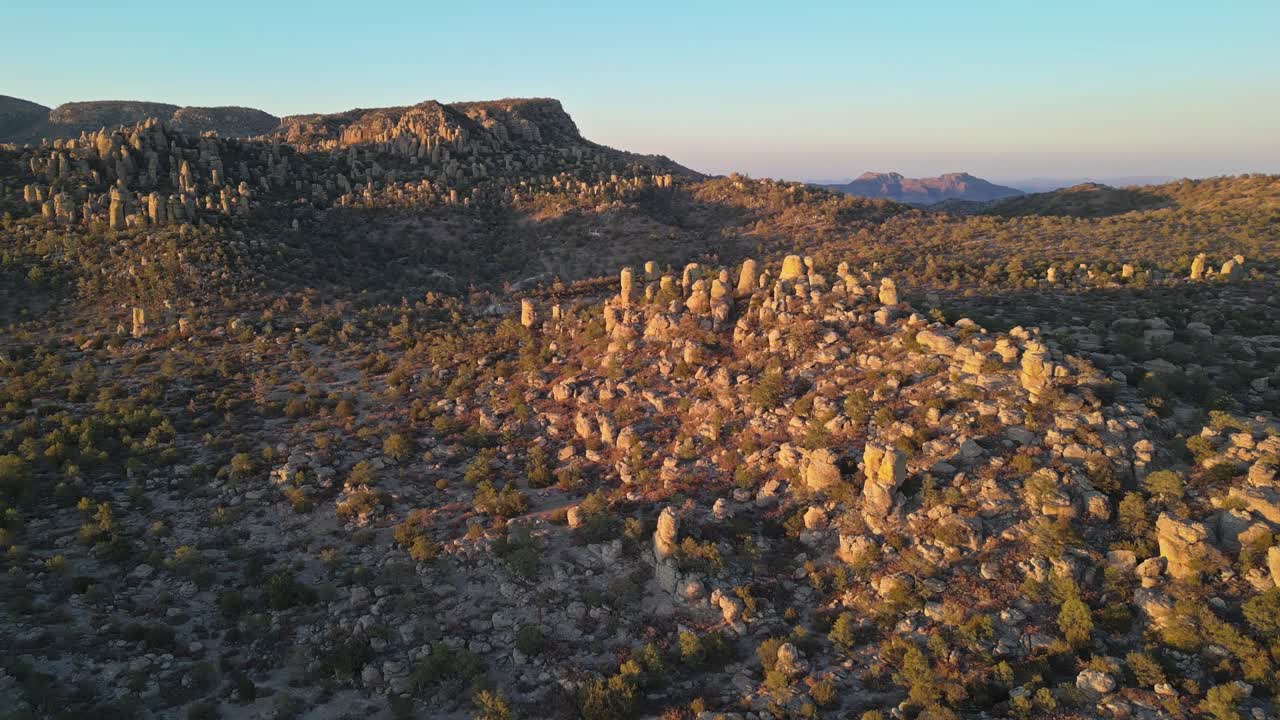 Rock formations glowing in warm light, Valle de los Monjes, Creel, Chihuahua, Mexico