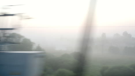 passing by a village in fog