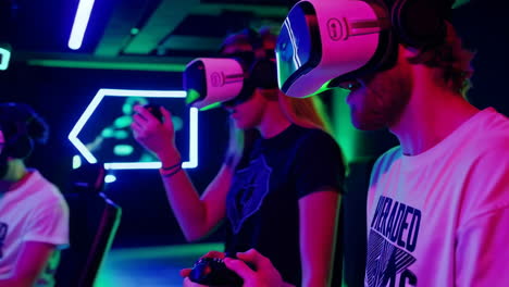 people playing vr games in an arcade