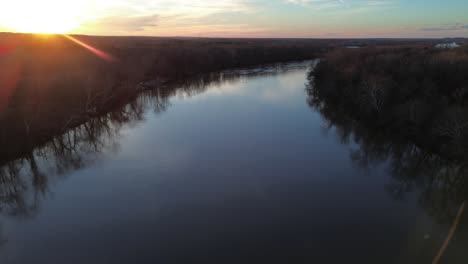 quiet james river landscape in cold winter morning twilight at sunrise