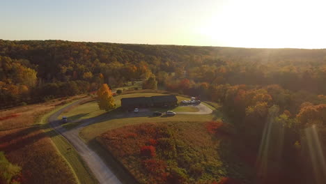 cinematic drone shot of an autumn forest in hocking hills in logan, ohio