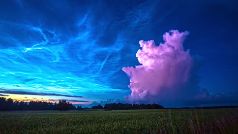 heavy clouds forming in the bright turquoise sky at dusk