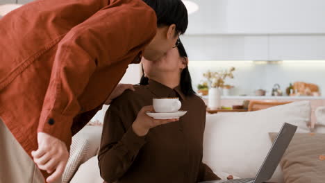 couple sharing a cup of coffee