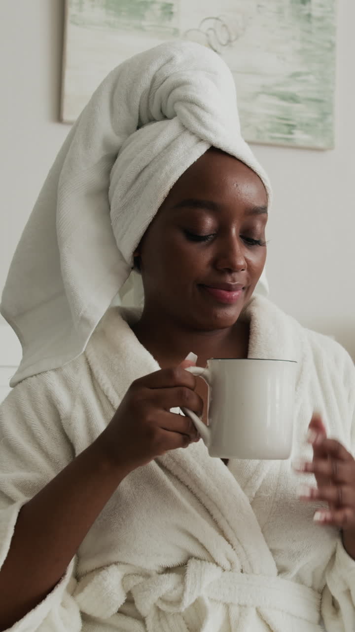Young Woman Drinking Tea when Relaxing at Home