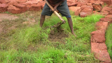 digging over the grass for road construction