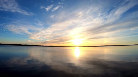 beautiful sunrise in the morning at calm lake scenery