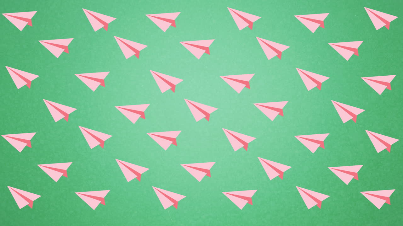 digitale animation mehrerer pinkfarbener papierflugzeuge, die gegen einen grünen hintergrund schwimmen