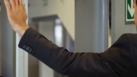 airport security officer checking a passenger