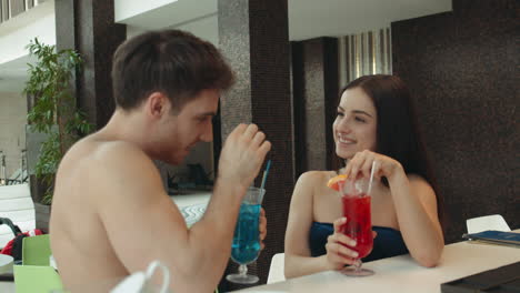 Couple-laughing-in-spa-cafeteria