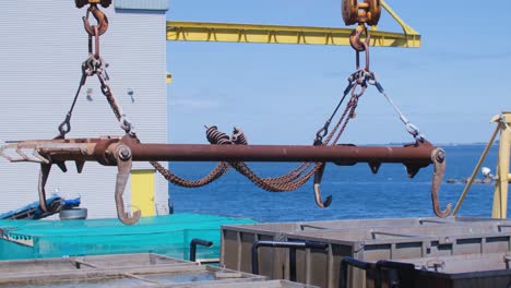 heavy machinery used in a fishing factory in slowmotion