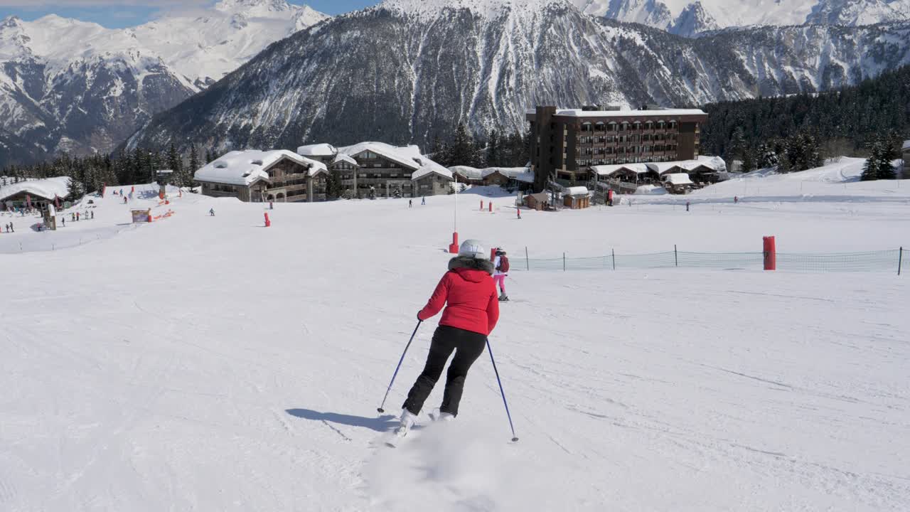 Skier Skiing Carving Style In The Mountains On The Slope Background The Chalet