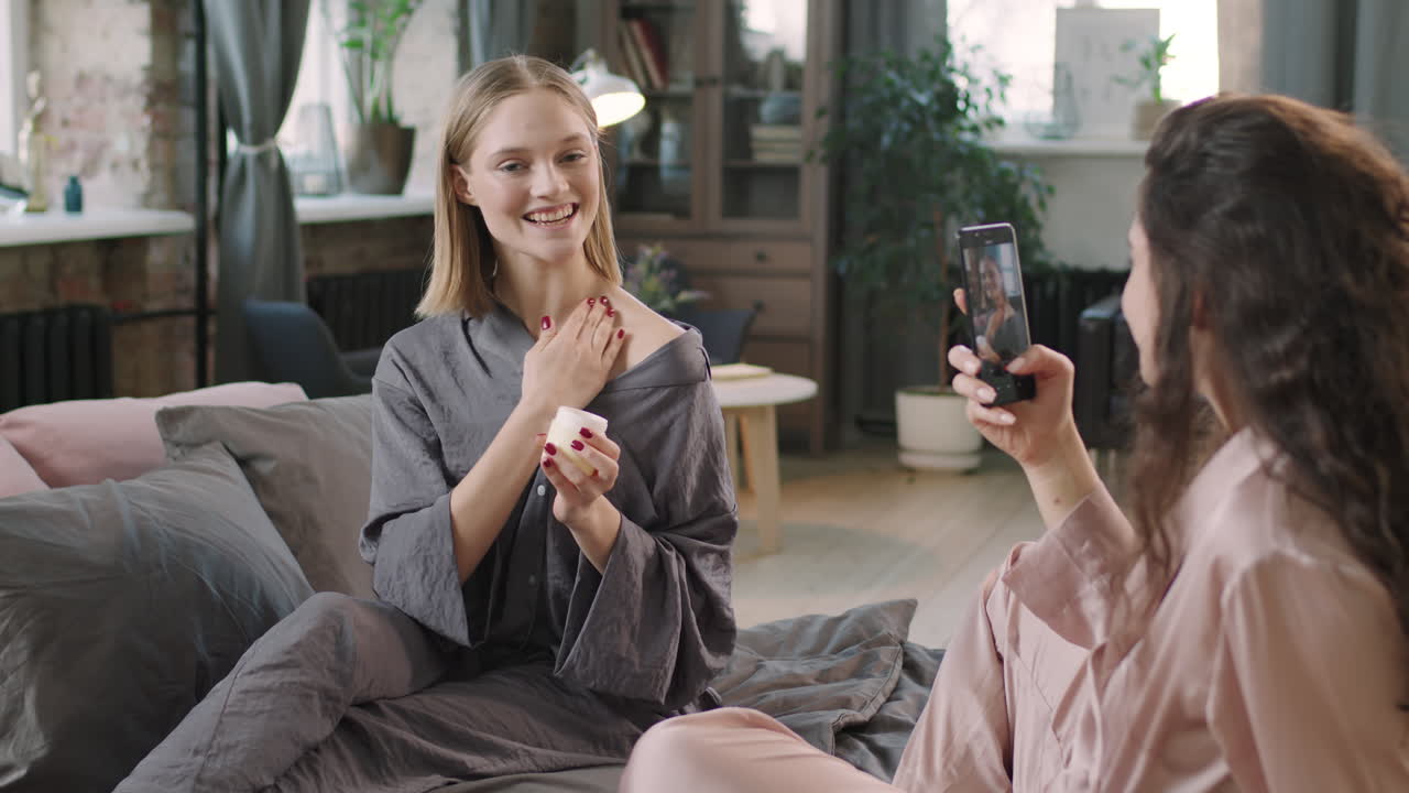 Girlfriends Recording Video Of Their Beauty Routine