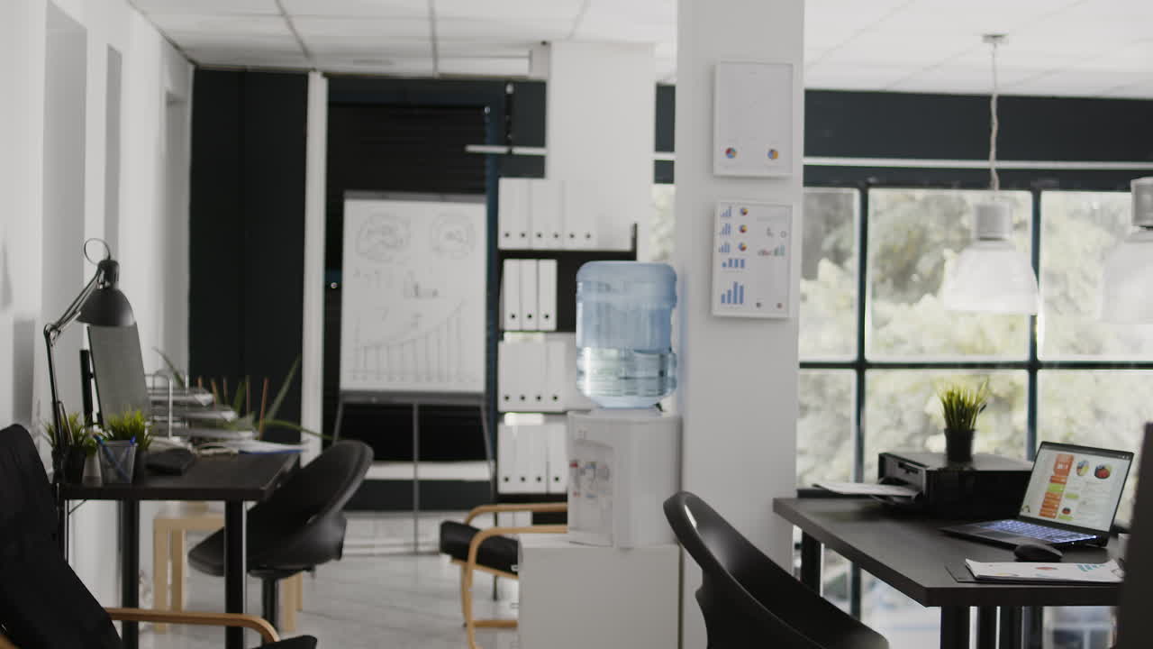 Office space with water cooler and whiteboard