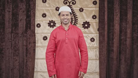 muslim man wearing his cap for the eid rituals