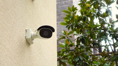 outdoor security camera on building wall