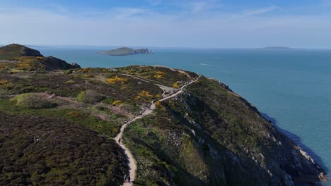 howth cliff hikers walk along coastal route in dublin ireland on a summers day