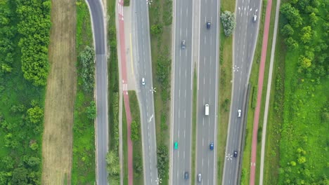 aerial view over a highway interchange during peak hour traffic