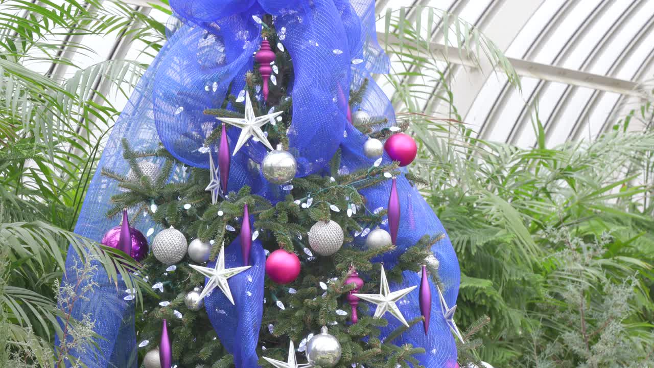 Decorated Blue Christmas Tree with Festive Ornaments