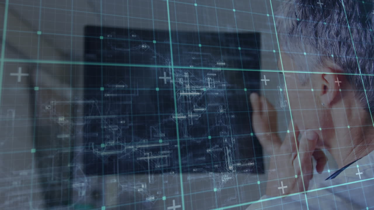 líneas de cuadrícula contra una doctora que examina la imagen de rayos x