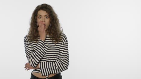 Shocked-woman-emotion-on-white-background.-Portrait-of-shocked-girl-in-studio