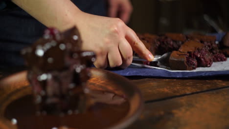 Men-tasting-chocolate-cake.-Brownie-stack-with-chocolate-on-plate