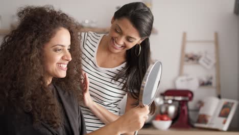 video of happy women starting hair beauty treatments at home