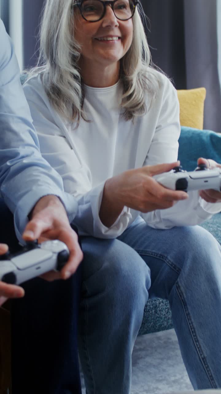 Senior Couple Enjoying Video Games at Home