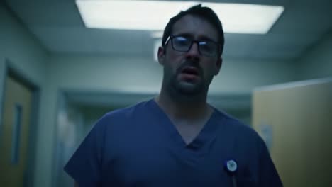 man in a hospital corridor