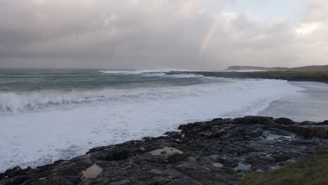 Slow-motion-shot-of-the-crashing-waves-during-a-storm-in-Allasdale-Bay,-near-Castlebay-on-the-Isle-of-Barra