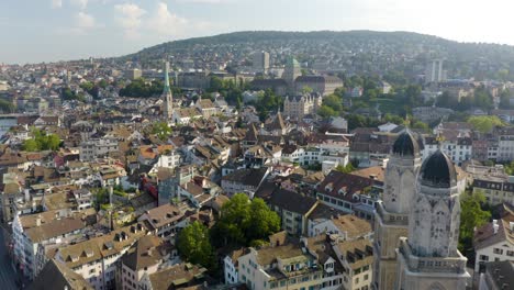 incredible establishing shot above grossmunster cathedral and zurich old town