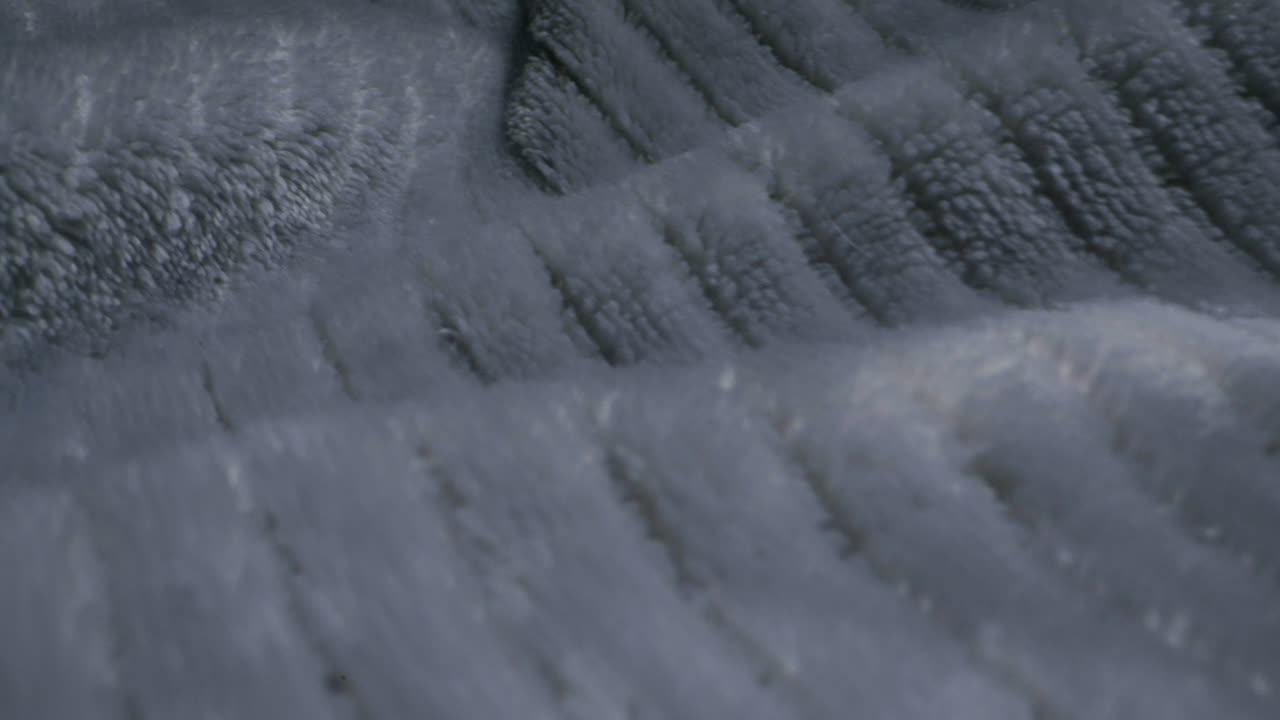 Close-up Abstract Grey Fabric Texture with Wavy Ridges