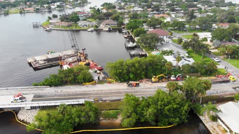 4k drone video of bridge repair crews working on 40th avenue bridge in st petersburg, florida on sunny summer day-4