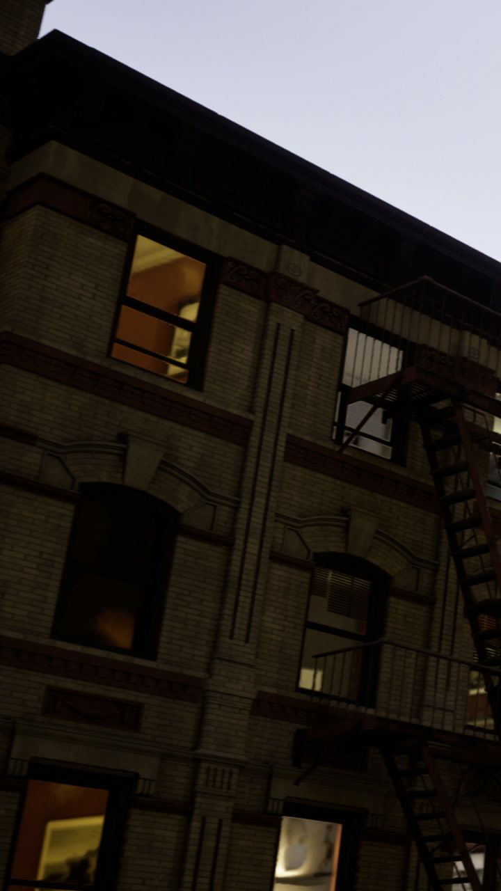 Building structures and fire escape in the city at dusk