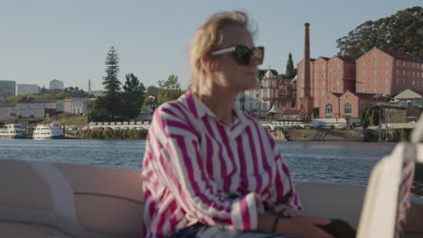 woman on a boat tour in porto, portugal