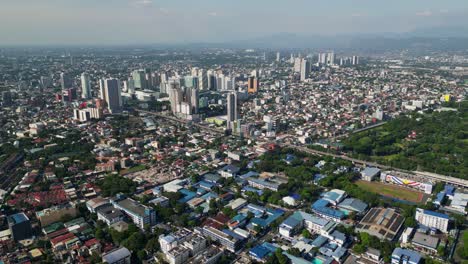 panoramic aerial overview of bustling cityscape and buildings at cubao, quezon city, philippines