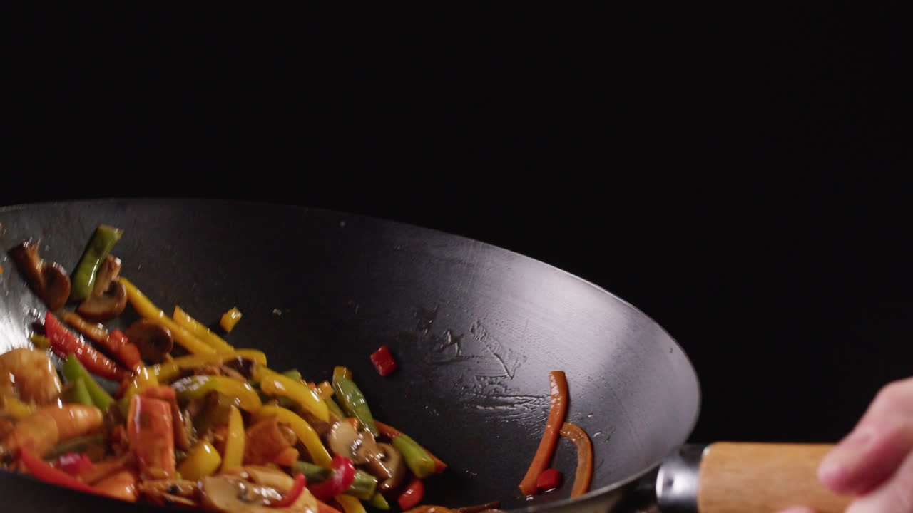 Stir-Frying Vegetables and Shrimp in a Wok