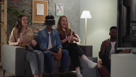 black man with vr headset and friends watch basketball game