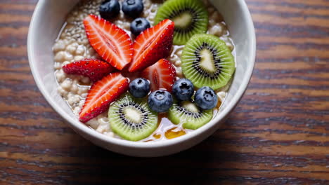 healthy breakfast bowl with berries and kiwi