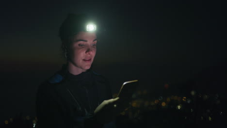 a woman wearing a head light