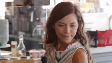 Female-Customer-Browsing-In-Delicatessen-Shot-On-R3D