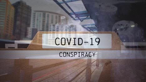Animation-of-file-with-words-Covid-19-Conspiracy-over-an-empty-street